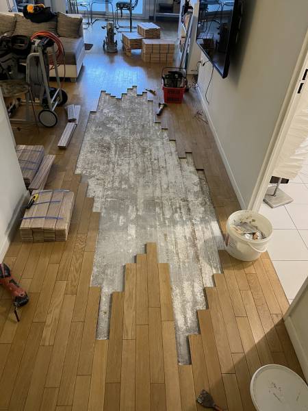 Réparation parquet Chene massif suite à dégât de eaux situé à de Boulogne Billancourt dans les Haut de Seine